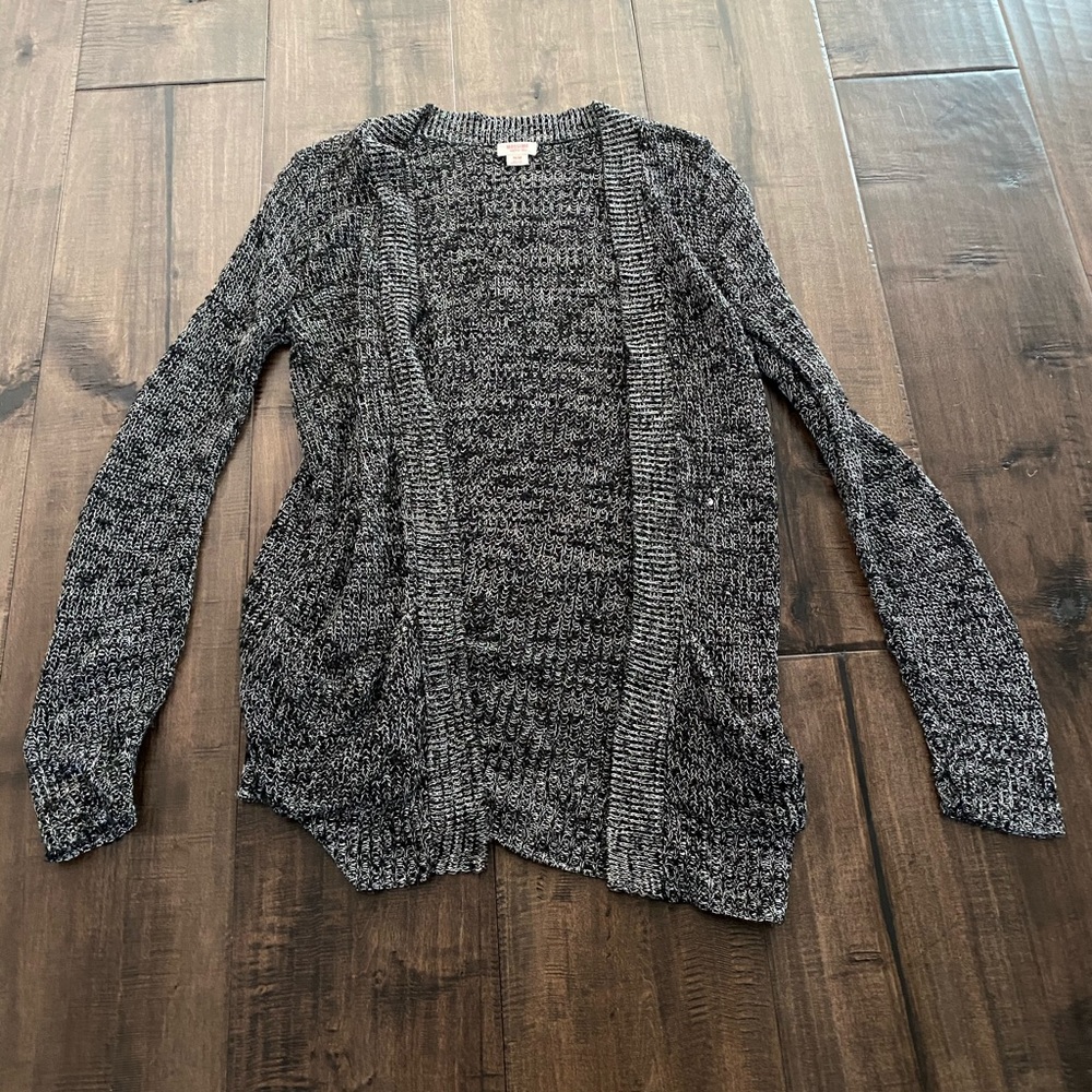 black and white toned cardigan.
